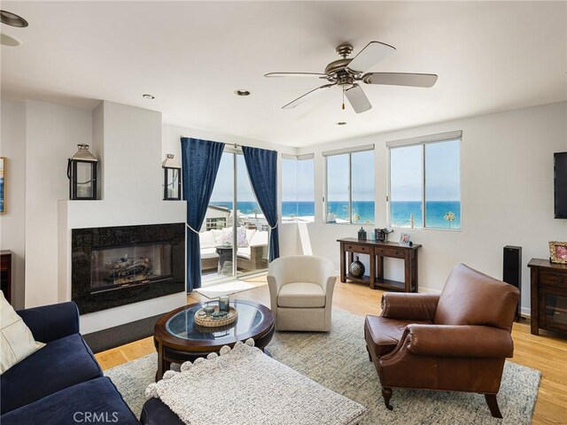 209 41st, Manhattan Beach, CA 90266 - living room with ceiling fan, a premium fireplace, and light wood-type flooring