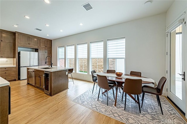 20754 W Bur Oak Cir, Porter Ranch, CA 91326 - dining area featuring light wood-style flooring and recessed lighting