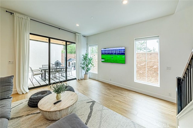 20754 W Bur Oak Cir, Porter Ranch, CA 91326 - living room featuring plenty of natural light, wood finished floors, and recessed lighting