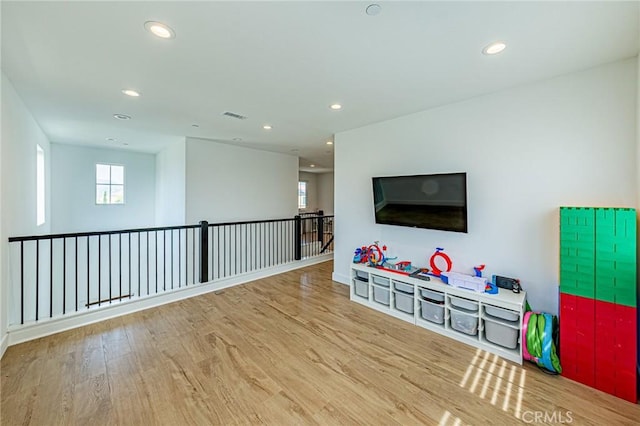 20754 W Bur Oak Cir, Porter Ranch, CA 91326 - game room with plenty of natural light, wood finished floors, and recessed lighting