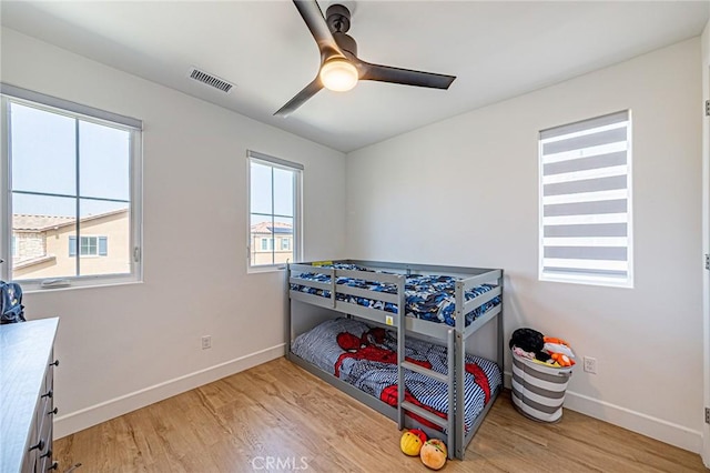 20754 W Bur Oak Cir, Porter Ranch, CA 91326 - bedroom with light wood-style floors and ceiling fan