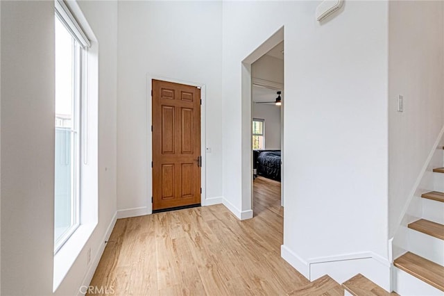 20754 W Bur Oak Cir, Porter Ranch, CA 91326 - entrance foyer with stairs and light wood-style flooring