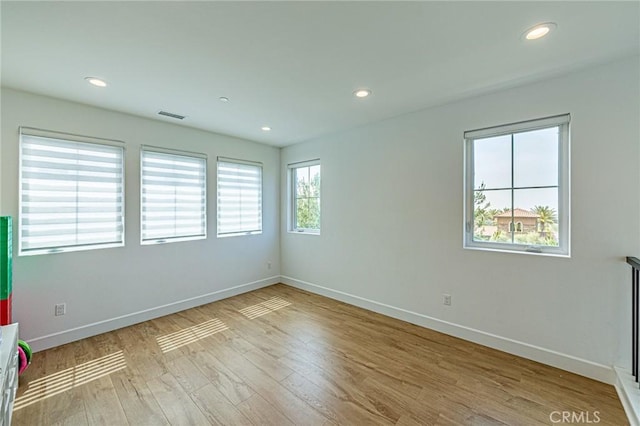 20754 W Bur Oak Cir, Porter Ranch, CA 91326 - empty room featuring wood finished floors and recessed lighting