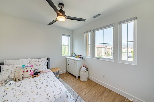 20754 W Bur Oak Cir, Porter Ranch, CA 91326 - bedroom featuring light wood-type flooring and a ceiling fan