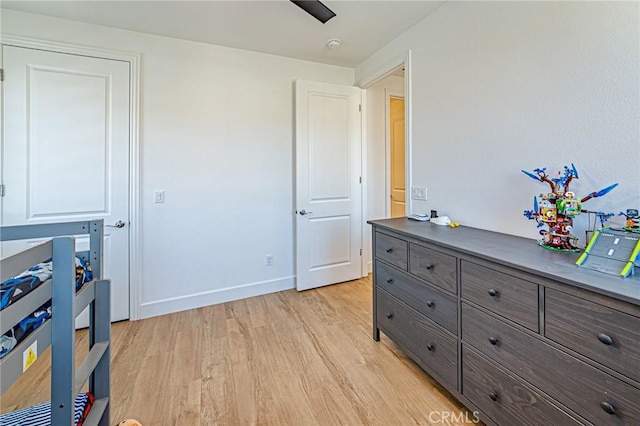 20754 W Bur Oak Cir, Porter Ranch, CA 91326 - bedroom featuring light wood finished floors and baseboards