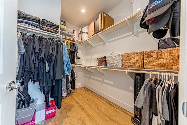 20754 W Bur Oak Cir, Porter Ranch, CA 91326 - walk in closet featuring wood finished floors