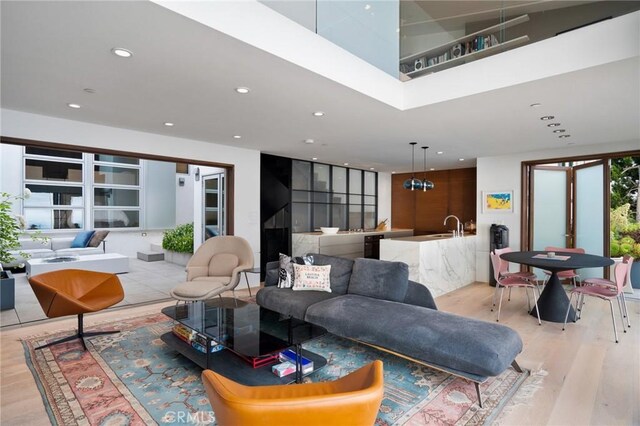 2517 Iris Way, Laguna Beach, CA 92651 - living room featuring light wood-type flooring and recessed lighting