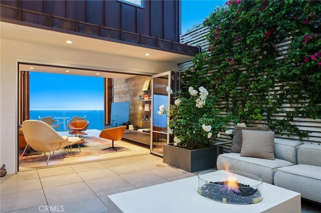 2517 Iris Way, Laguna Beach, CA 92651 - view of patio / terrace with an outdoor living space with a fire pit