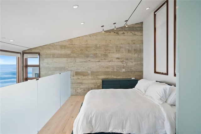 2517 Iris Way, Laguna Beach, CA 92651 - bedroom featuring vaulted ceiling, wood finished floors, recessed lighting, and wooden walls