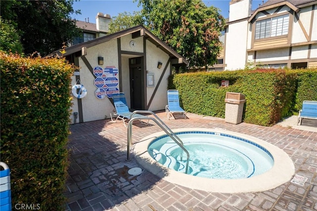 21149 Lassen St Unit 6, Chatsworth, CA 91311 - view of swimming pool with a hot tub and a patio