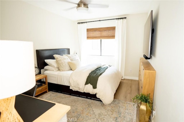 21149 Lassen St Unit 6, Chatsworth, CA 91311 - bedroom featuring light wood finished floors, baseboards, and ceiling fan