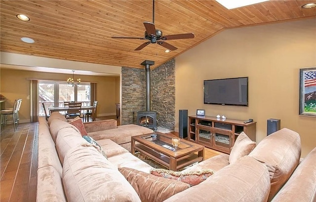 1709 Lassen Way, Pine Mountain Club, CA 93222 - living area featuring wood ceiling, a wood stove, hardwood / wood-style flooring, ceiling fan, and a chandelier