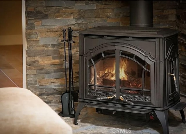 1709 Lassen Way, Pine Mountain Club, CA 93222 - detailed view of a wood stove and concrete floors
