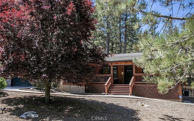 1709 Lassen Way, Pine Mountain Club, CA 93222 - view of property hidden behind natural elements with a porch and stairs