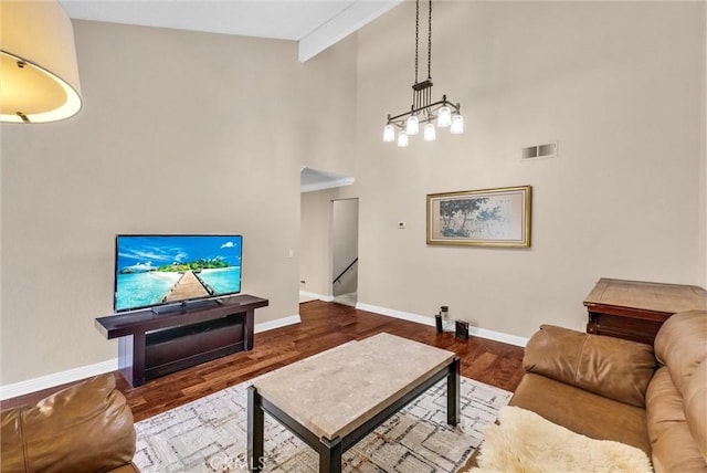 2243 Calle Taxco, West Covina, CA 91792 - living room featuring wood finished floors, baseboards, high vaulted ceiling, a chandelier, and beamed ceiling