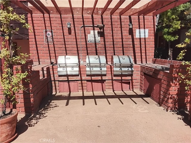 5414 Newcastle Ave Unit 7, Encino, CA 91316 - view of patio / terrace with an outdoor kitchen