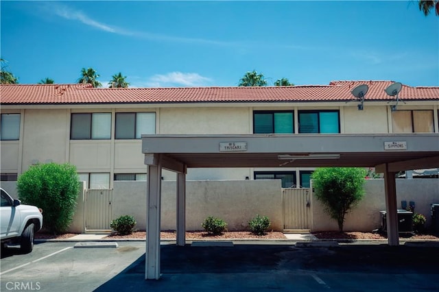 60545 Montecito Dr Unit 5, Palm Springs, CA 92264 - view of building exterior featuring covered parking