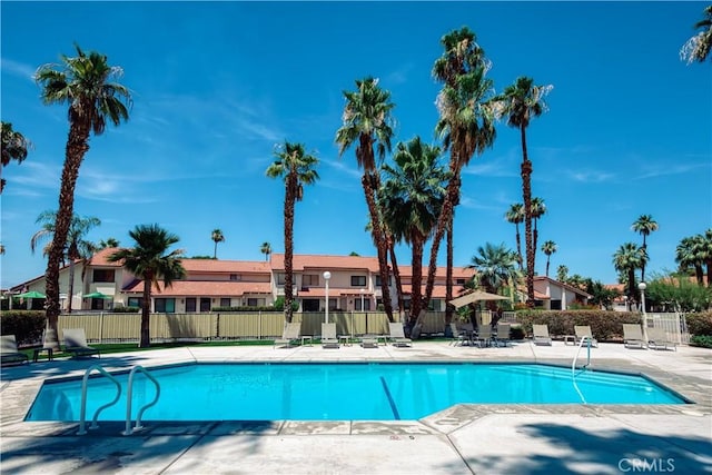 60545 Montecito Dr Unit 5, Palm Springs, CA 92264 - community pool with a patio area