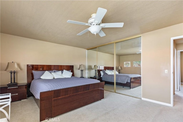 60545 Montecito Dr Unit 5, Palm Springs, CA 92264 - carpeted bedroom with a closet and a ceiling fan