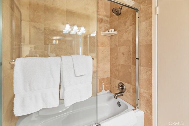 60545 Montecito Dr Unit 5, Palm Springs, CA 92264 - bathroom featuring shower / bath combination with glass door
