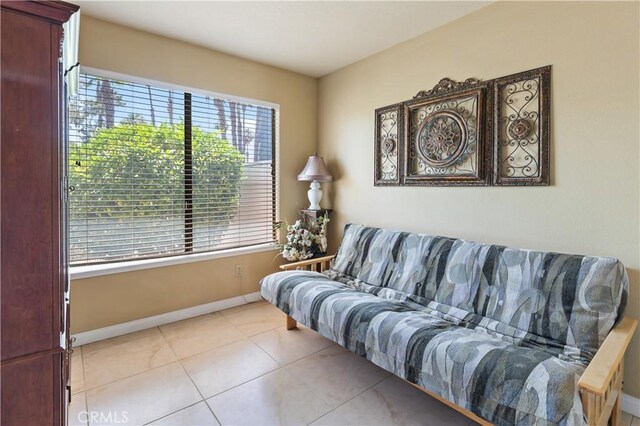 60545 Montecito Dr Unit 5, Palm Springs, CA 92264 - living area with baseboards and tile patterned flooring