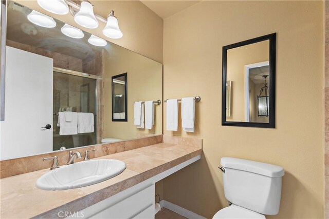 60545 Montecito Dr Unit 5, Palm Springs, CA 92264 - bathroom with a stall shower and vanity