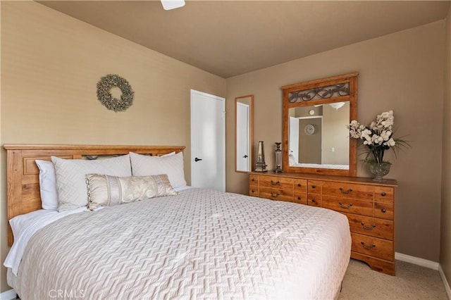 60545 Montecito Dr Unit 5, Palm Springs, CA 92264 - carpeted bedroom with baseboards