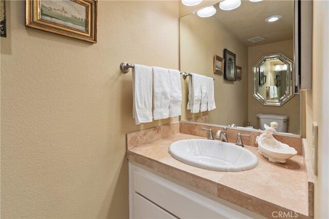 60545 Montecito Dr Unit 5, Palm Springs, CA 92264 - bathroom featuring vanity and recessed lighting