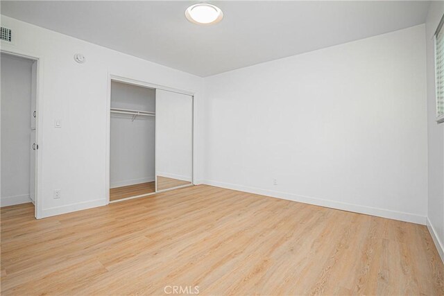 18259 Midbury St, Brea, CA 92821 - unfurnished bedroom featuring light wood-type flooring and a closet