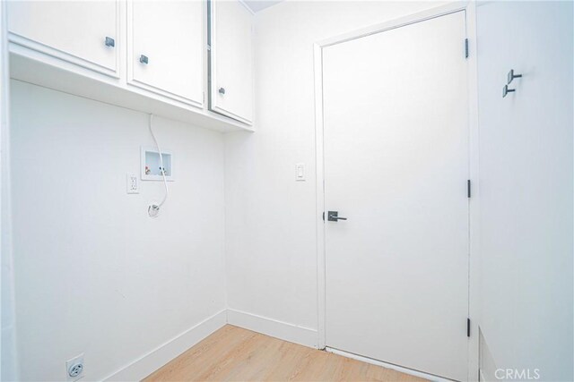 18259 Midbury St, Brea, CA 92821 - laundry room with hookup for a washing machine, cabinet space, light wood-type flooring, and electric dryer hookup
