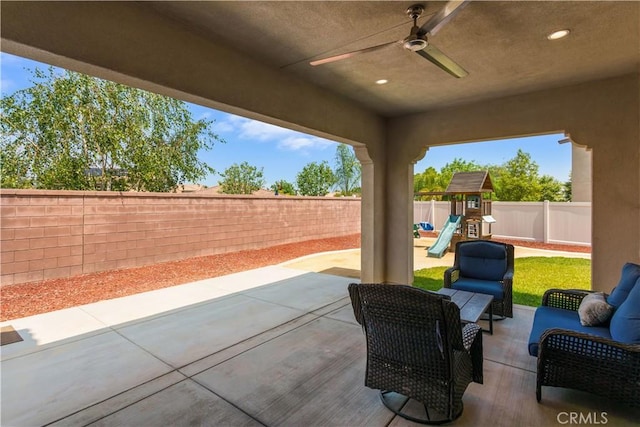 34901 Limecrest Pl, Murrieta, CA 92563 - fenced backyard with a playground, a ceiling fan, a patio, and outdoor lounge area
