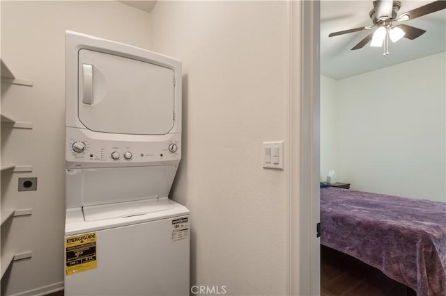 34901 Limecrest Pl, Murrieta, CA 92563 - laundry room with stacked washer / dryer and a ceiling fan
