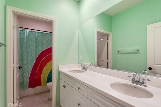 34901 Limecrest Pl, Murrieta, CA 92563 - bathroom featuring double vanity and a shower with shower curtain