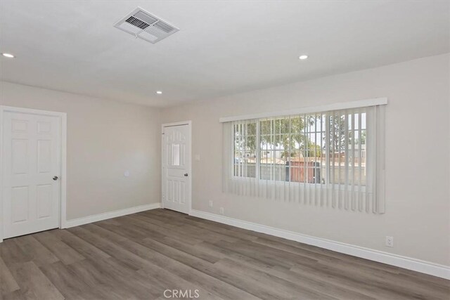 35010 Cedar Rd, Barstow, CA 92311 - foyer with baseboards, wood finished floors, and recessed lighting