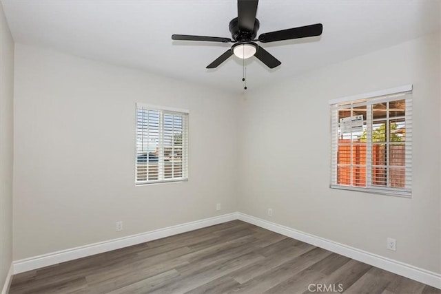 35010 Cedar Rd, Barstow, CA 92311 - unfurnished room featuring wood finished floors, baseboards, and ceiling fan