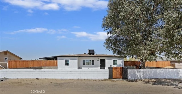 35010 Cedar Rd, Barstow, CA 92311 - view of front of property with a fenced front yard and stucco siding