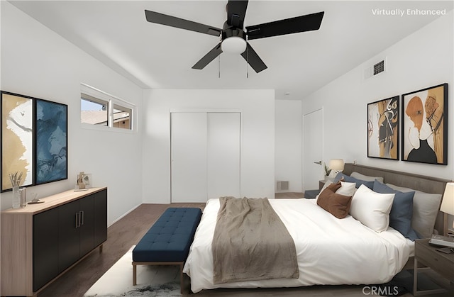 3221 W Jacinto View Rd, Banning, CA 92220 - bedroom featuring a closet, wood finished floors, and a ceiling fan