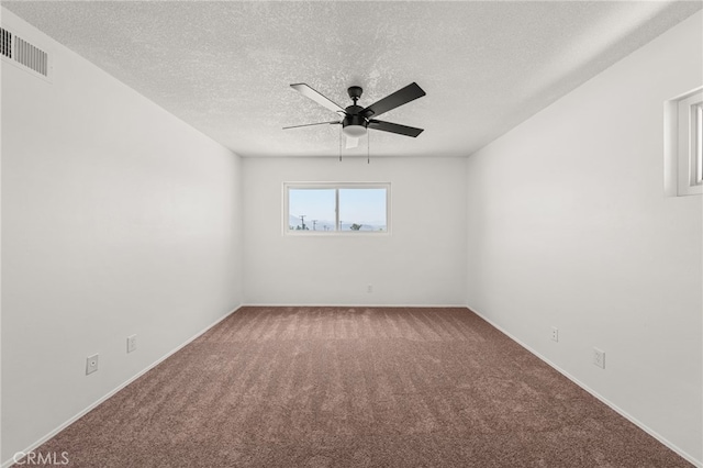 3221 W Jacinto View Rd, Banning, CA 92220 - spare room with carpet floors, ceiling fan, a textured ceiling, and baseboards