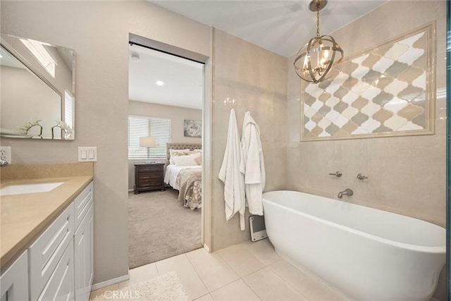 5020 Windy Cir, Yorba Linda, CA 92887 - full bathroom featuring a soaking tub, vanity, a chandelier, ensuite bathroom, and tile patterned flooring