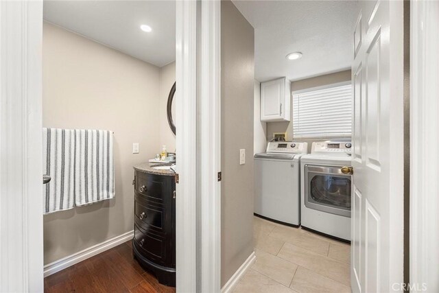 5020 Windy Cir, Yorba Linda, CA 92887 - laundry area featuring washer and clothes dryer, baseboards, cabinet space, and recessed lighting