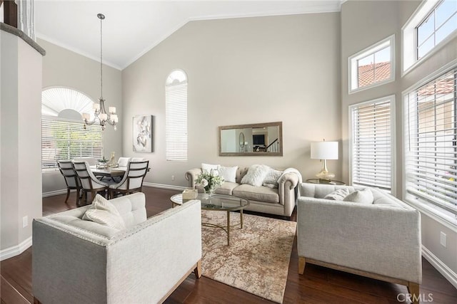 5020 Windy Cir, Yorba Linda, CA 92887 - living area featuring high vaulted ceiling, dark wood finished floors, healthy amount of natural light, and crown molding