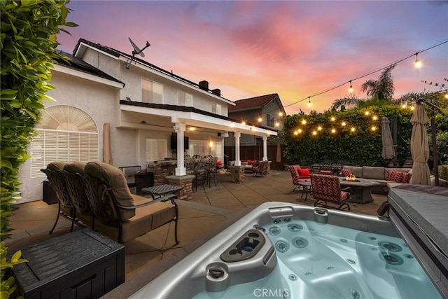 5020 Windy Cir, Yorba Linda, CA 92887 - view of patio featuring an outdoor living space with a fire pit and a hot tub