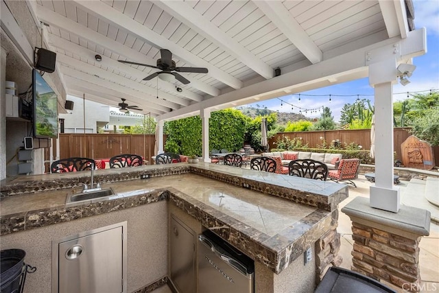 5020 Windy Cir, Yorba Linda, CA 92887 - fenced backyard with a ceiling fan and exterior kitchen