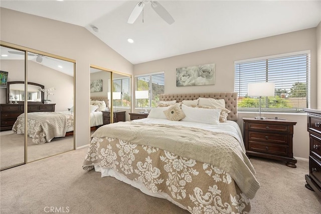 5020 Windy Cir, Yorba Linda, CA 92887 - bedroom featuring two closets, light carpet, vaulted ceiling, a ceiling fan, and recessed lighting