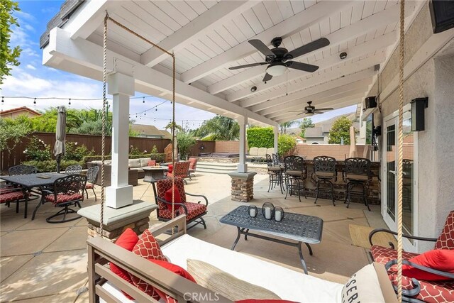 5020 Windy Cir, Yorba Linda, CA 92887 - fenced backyard with outdoor lounge area, a patio, outdoor dining space, and ceiling fan