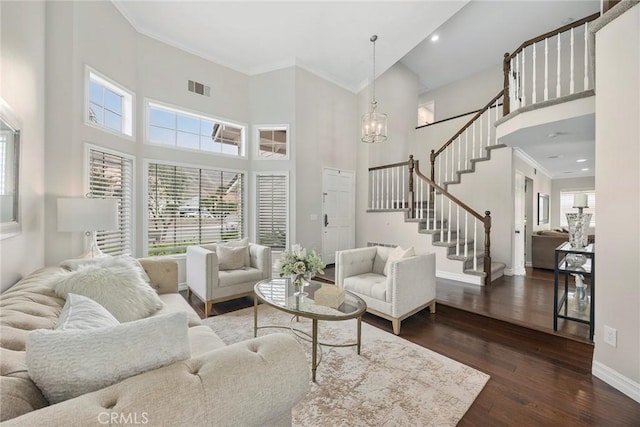 5020 Windy Cir, Yorba Linda, CA 92887 - living area with a high ceiling, ornamental molding, stairway, baseboards, and dark wood-style floors