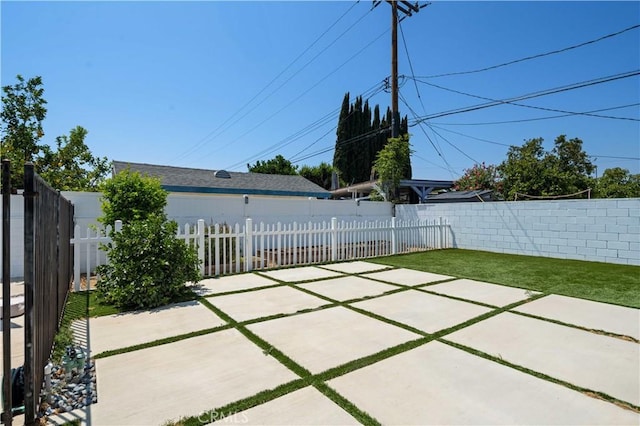 2241 Cordero Ave, Simi Valley, CA 93065 - fenced backyard with a patio area
