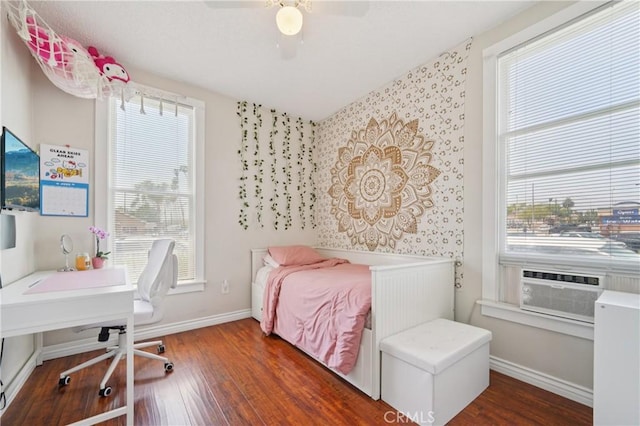 382 N Palomares St, Pomona, CA 91767 - bedroom featuring wood finished floors, multiple windows, an office area, and wallpapered walls