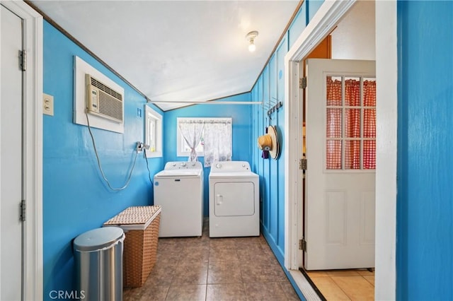 382 N Palomares St, Pomona, CA 91767 - laundry area featuring washing machine and clothes dryer, tile patterned flooring, and a wall mounted air conditioner