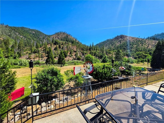 38727 State Highway 96, Klamath River, CA 96050 - view of patio featuring a mountain view and a wooded view